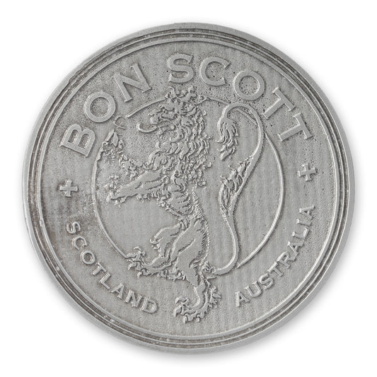 Silver coin with 'Bon Scott' and a lion emblem on a white background